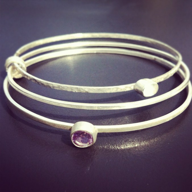 Commissioned Bracelet with Moonstone and Amethyst stones. The silver in this piece was reused from old jewellery the owner no longer wore and I recreated it into this piece. 